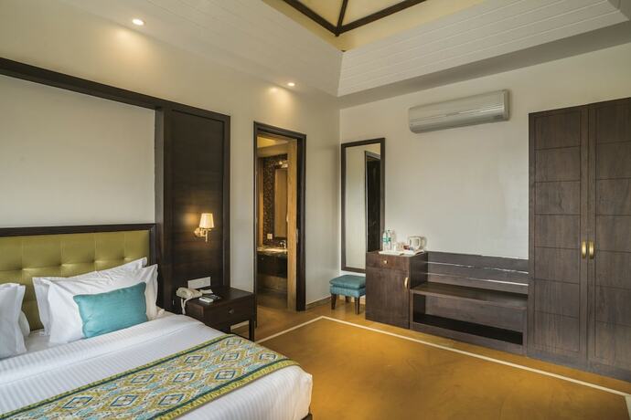 Imagen de la habitación del Hotel Mahua Bagh Resort. Foto 19