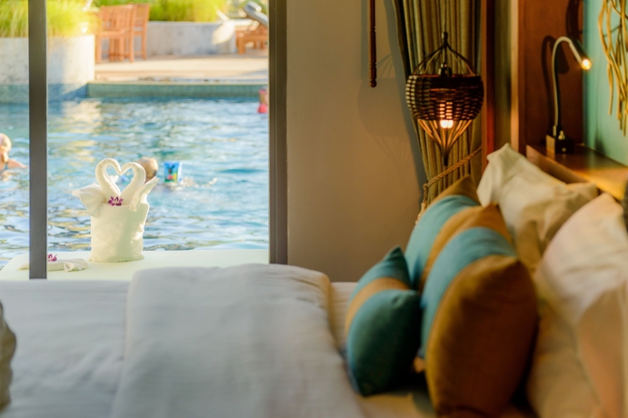 Imagen de la habitación del Hotel Mai Khao Lak Beach Resort and Spa. Foto 11