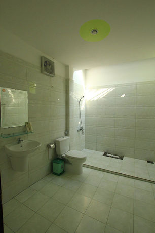 Imagen de la habitación del Hotel Mai Phuong Binh Bungalow. Foto 2