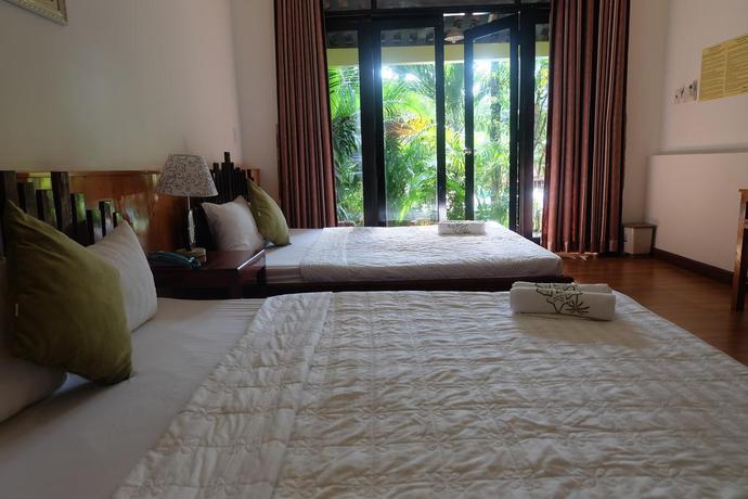 Imagen de la habitación del Hotel Mai Phuong Binh Bungalow. Foto 3