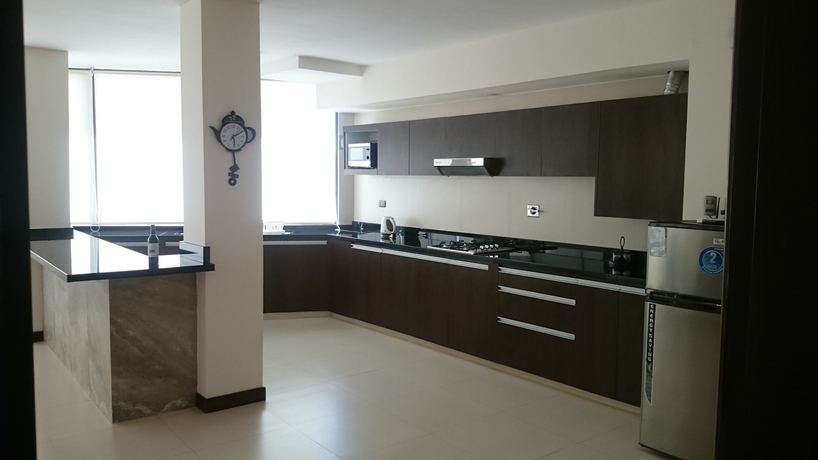 Imagen de la habitación del Hotel Mai Suites. Foto 6