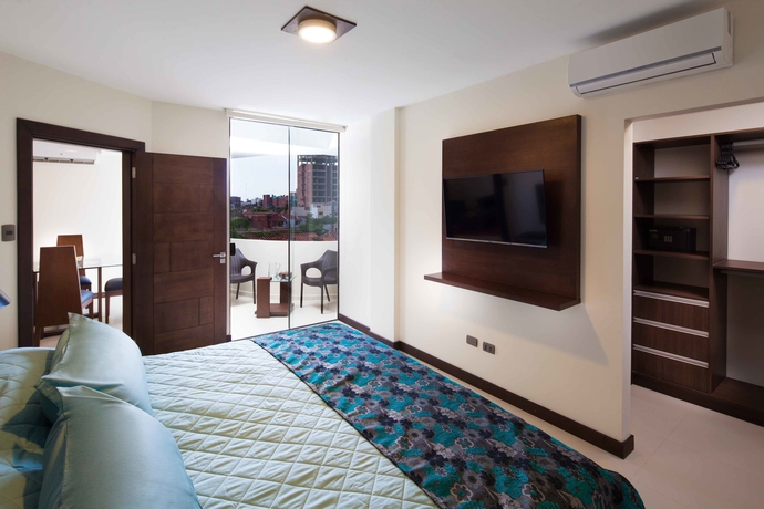 Imagen de la habitación del Hotel Mai Suites. Foto 8