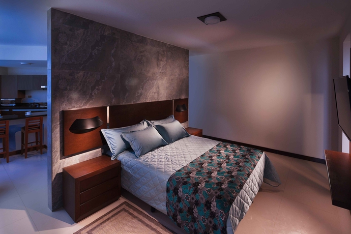 Imagen de la habitación del Hotel Mai Suites. Foto 10