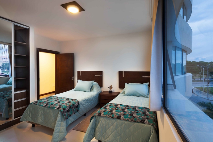 Imagen de la habitación del Hotel Mai Suites. Foto 12