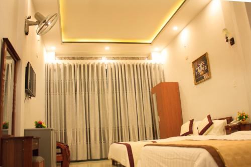 Imagen de la habitación del Hotel Mai Tra. Foto 9
