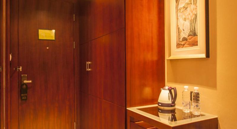 Imagen de la habitación del Hotel MaiXinGe International Hotel. Foto 5