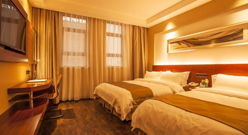 Imagen de la habitación del Hotel MaiXinGe International Hotel. Foto 6