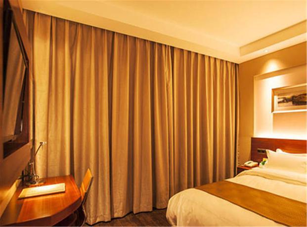 Imagen de la habitación del Hotel MaiXinGe International Hotel. Foto 10