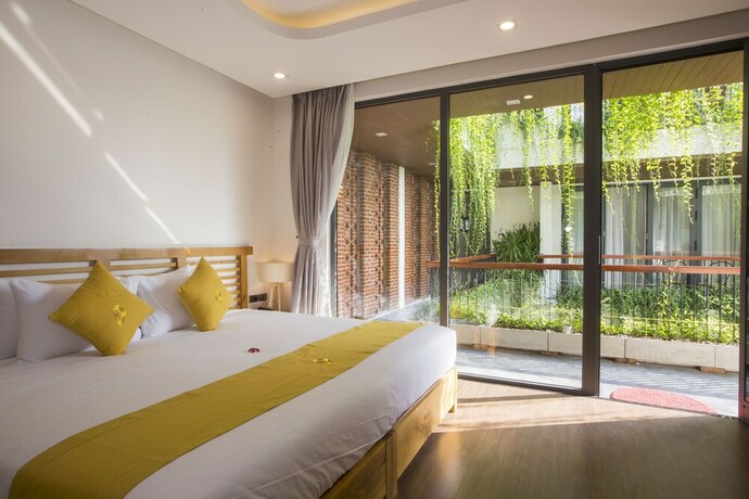 Imagen de la habitación del Hotel Maichi Villa Hoi An. Foto 17
