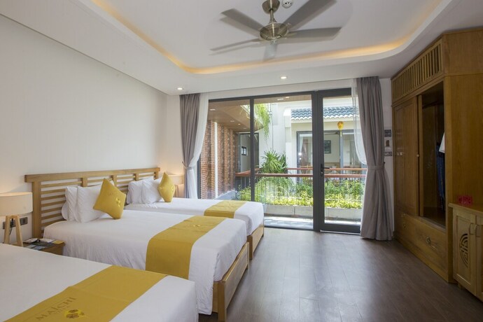 Imagen de la habitación del Hotel Maichi Villa Hoi An. Foto 23