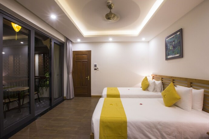 Imagen de la habitación del Hotel Maichi Villa Hoi An. Foto 24
