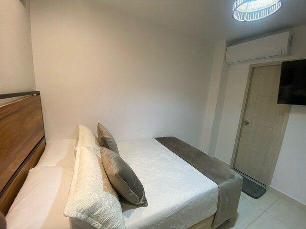 Imagen de la habitación del Hotel Maidy Luxury. Foto 18