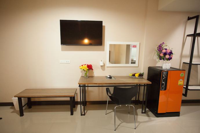 Imagen de la habitación del Hotel Maihom Villa. Foto 14