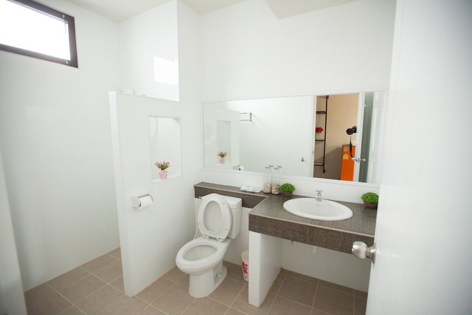 Imagen de la habitación del Hotel Maihom Villa. Foto 15