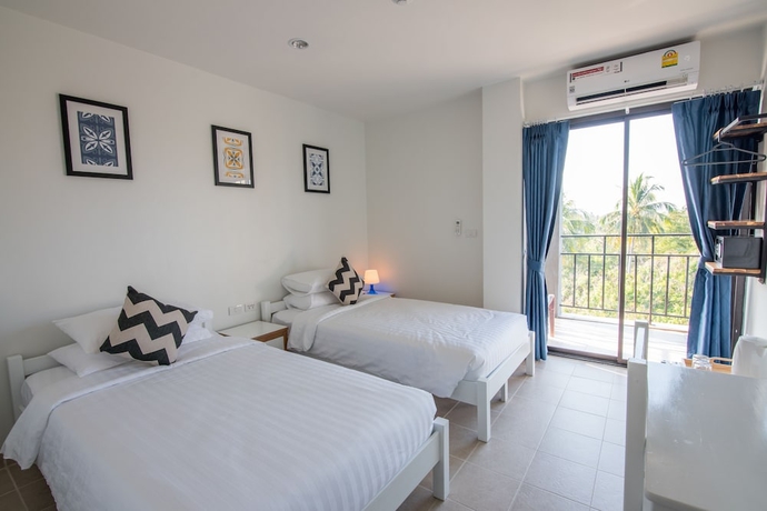 Imagen de la habitación del Hotel Maikhao. Foto 7