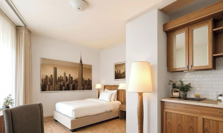 Imagen de la habitación del Hotel Main Plaza Suite Tower. Foto 12