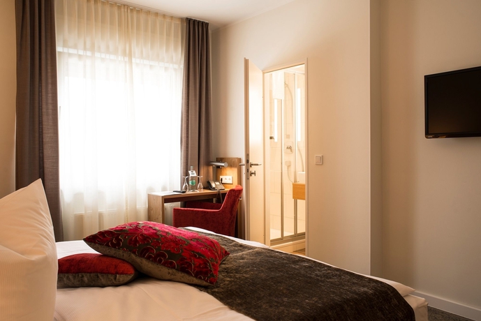 Imagen de la habitación del Hotel Maingau. Foto 4