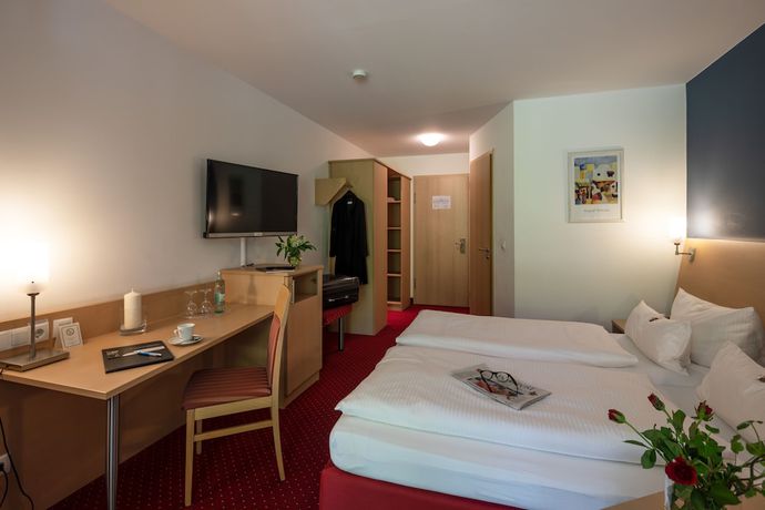Imagen de la habitación del Hotel Mainpromenade. Foto 3