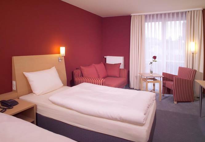 Imagen de la habitación del Hotel Mainpromenade. Foto 9