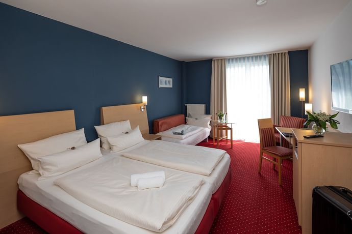 Imagen de la habitación del Hotel Mainpromenade. Foto 13