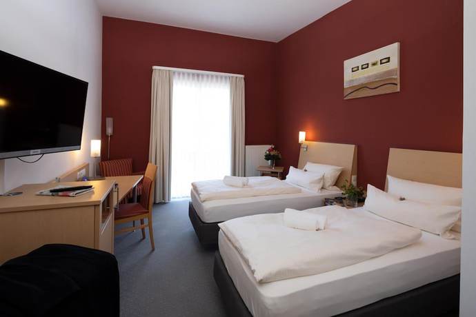 Imagen de la habitación del Hotel Mainpromenade. Foto 14