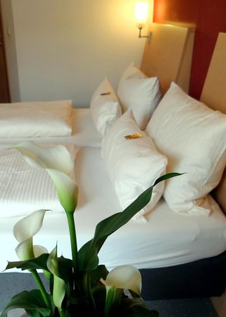 Imagen de la habitación del Hotel Mainpromenade. Foto 15