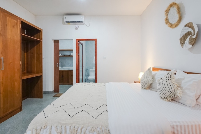 Imagen de la habitación del Hotel Maisaba Coliving Cempaka. Foto 3