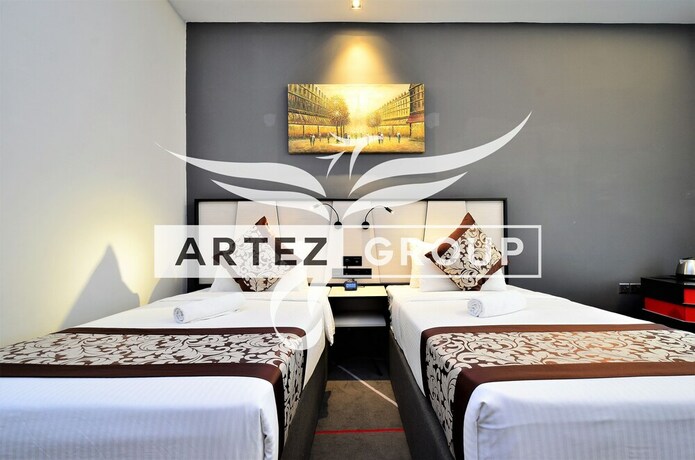 Imagen de la habitación del Hotel Maison 101 Dang Wangi By Artez. Foto 11
