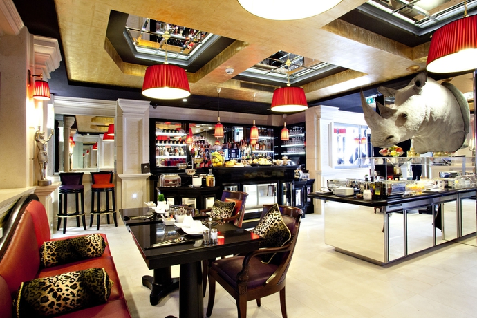 Imagen del bar/restaurante del Hotel Maison Albar Hotels Le Champs-elysées. Foto 1