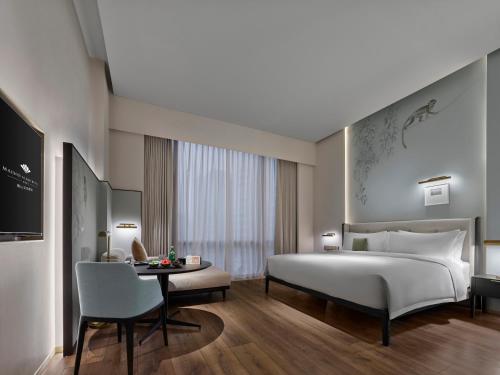 Imagen de la habitación del Hotel Maison Albars Leshan. Foto 19