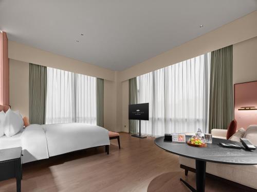 Imagen de la habitación del Hotel Maison Albars Leshan. Foto 20