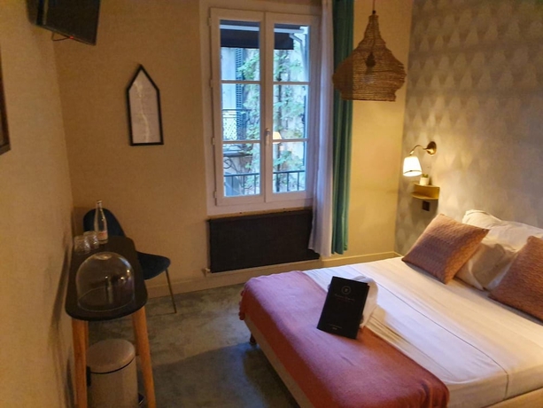 Imagen de la habitación del Hotel Maison Arquier, The Originals Relais. Foto 11