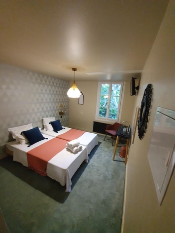 Imagen de la habitación del Hotel Maison Arquier, The Originals Relais. Foto 16