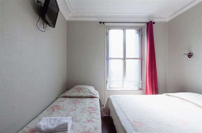 Imagen de la habitación del Hotel Maison Barbès. Foto 6