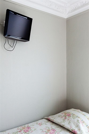 Imagen de la habitación del Hotel Maison Barbès. Foto 8