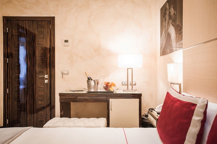 Imagen de la habitación del Hotel Maison Candia Luxury House. Foto 5