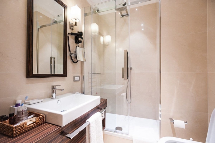 Imagen de la habitación del Hotel Maison Candia Luxury House. Foto 13