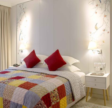 Imagen de la habitación del Hotel Maison De Camille Boutique. Foto 3