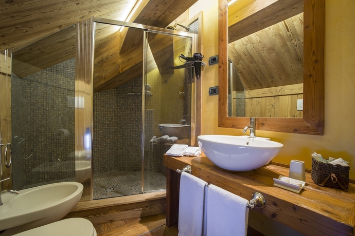 Imagen de la habitación del Hotel Maison De Neige. Foto 13