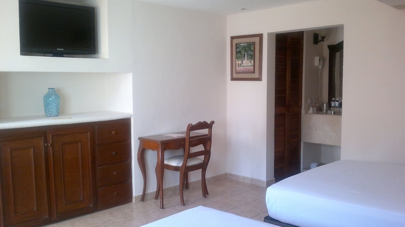 Imagen de la habitación del Hotel Maison Del Embajador. Foto 5