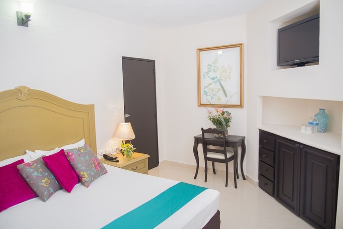 Imagen de la habitación del Hotel Maison Del Embajador. Foto 9