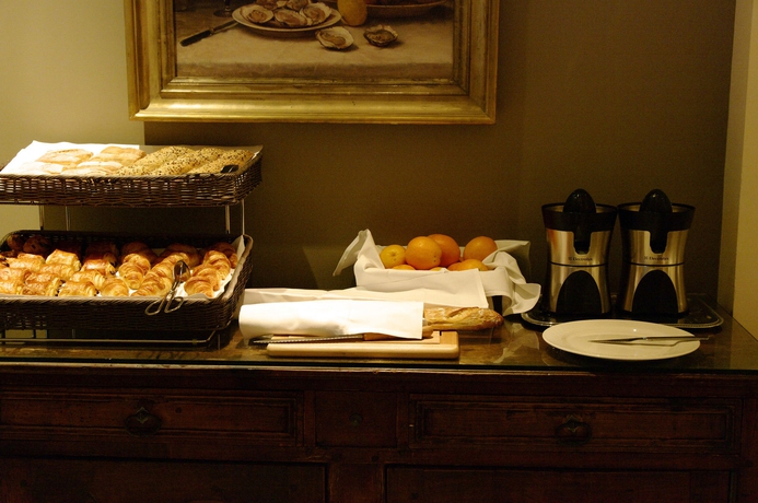 Imagen del bar/restaurante del Hotel Maison Des Ambassadeurs. Foto 4