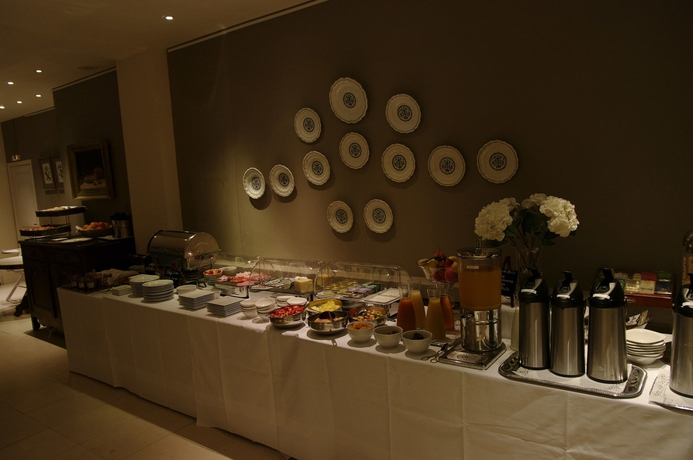 Imagen del bar/restaurante del Hotel Maison Des Ambassadeurs. Foto 6