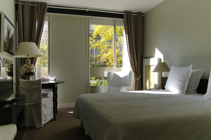 Imagen de la habitación del Hotel Maison Des Ambassadeurs. Foto 14