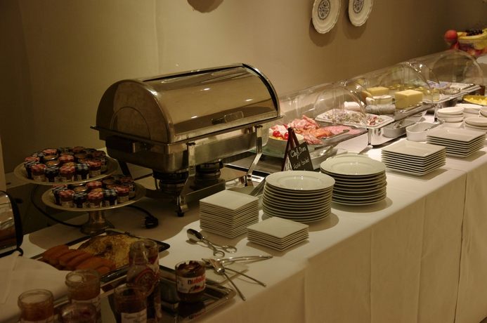 Imagen del bar/restaurante del Hotel Maison Des Ambassadeurs. Foto 7