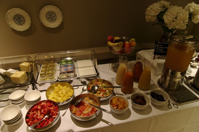 Imagen del bar/restaurante del Hotel Maison Des Ambassadeurs. Foto 8