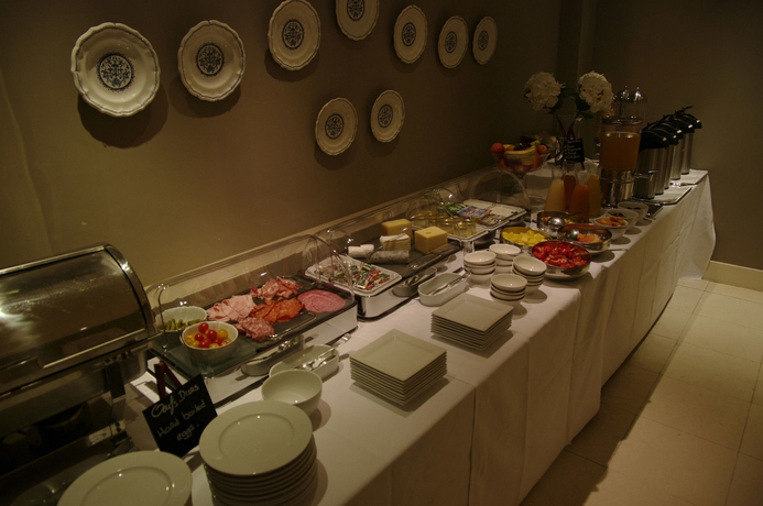 Imagen del bar/restaurante del Hotel Maison Des Ambassadeurs. Foto 10