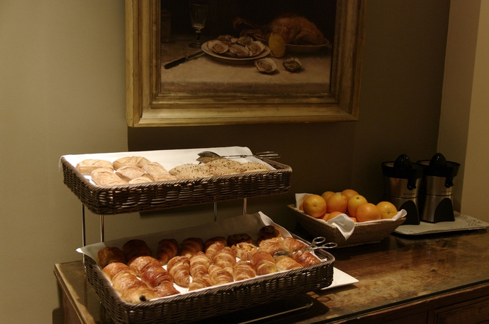 Imagen del bar/restaurante del Hotel Maison Des Ambassadeurs. Foto 13