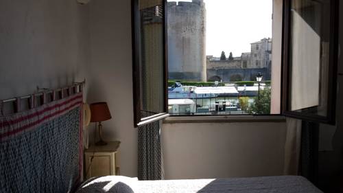 Imagen de la habitación del Hotel Maison Des Croisades. Foto 4