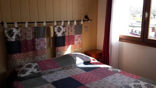 Imagen de la habitación del Hotel Maison Des Croisades. Foto 12